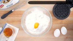 Mini Electric Waffle Maker—portable breakfast maker with non-stick cooking plates suitable for making waffles cookies and breakfast treats
