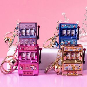 CHARMST คาวาอิ น่ารักน่ารักๆ เกมคอนโซลเกม สาวๆ ของขวัญของเล่นของเล่น ที่แขวนโทรศัพท์มือถือ เครื่องเลี้ยวจำลอง มินิอาร์เคด สำหรับผู้หญิง ที่ใส่พวงกุญแจการ์ตูน จี้ห้อยกระเป๋า พวงกุญแจพร้อมกระดิ่ง แหวนกุญแจรถ