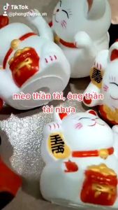 Mèo Thần Tài  Ông Thần Tài nhựa trang trí lễ Tết vòng hoa đào đông