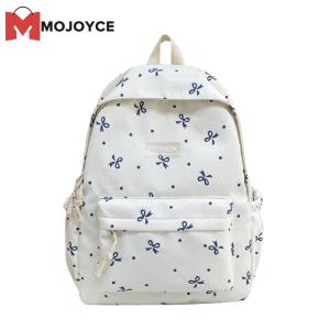 กระเป๋าเป้ลายดอกไม้ความจุขนาดใหญ่ของผู้หญิง MOJOYCE พร้อมกระเป๋าสะพายหลังมีโบว์ปิดที่ทันสมัยสำหรับการเดินทางและการใช้ประจำวันเพื่อนร่วมเดินทางของผู้หญิงที่ทันสมัย