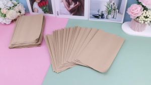 ถุงกระดาษใช้แล้วทิ้ง 100 แพ็คถุงทิ้งผ้าอนามัย ถุงทิ้งสุขอนามัยสำหรับผู้หญิง ถุงกระดาษคราฟท์ แข็งแรงและกันน้ำ เหมาะสำหรับผ้าอนามัย ถุงของขวัญ
