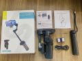 Gimbal chống rung cho điện thoại 3-Axis L9,  Tay cầm gimbal chống rung, Gimball chống rung chuyên nghiệp, Gimble quay phim chụp ảnh , quay tik tok, có thể kéo đai, hỗ trợ AI theo dõi thông minh tích hợp đèn trợ sáng. 