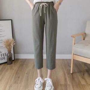 【ราคาพิเศษ】ฤดูร้อนกางเกง7ส่วน กางเกงผ้าฝ้ายและผ้าลินินขากระบอกเล็ก เชือกผูกเอว เอวยืดได้ใหญ่