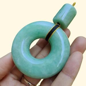 Hugh Light Green crafted with Shape of Donut and Cylinder Natural Type A Jadeite Jade as Pendant certificate weighs 73.85 and 12.55 grams measurements 52.8 * 52.7 * 14.3 19.1 * 16.3 mm (pendant290)