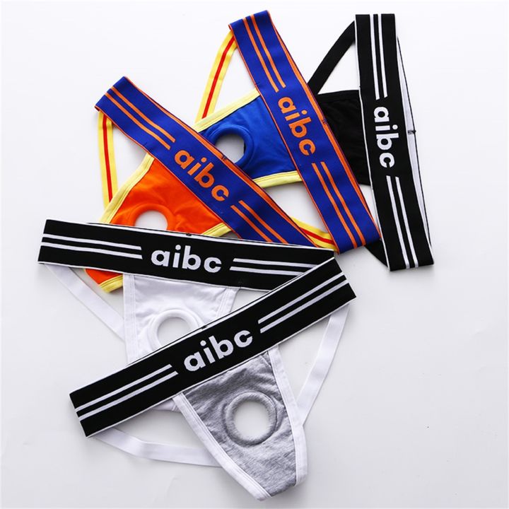 New 2023 Clever Menmode Sexy Mens Hollow Out Jockstrap Thong Penis Hole Silicone O Ring 0416