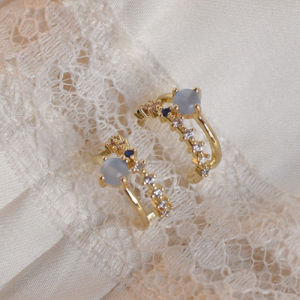 หูฟังเอียร์สไตล์ลักษณะสูงหรูหราสตรีใหม่สไตล์น้อยที่ออกแบบสินค้าเฉพาะกันเว็บไซต์เฮอร์โร่หูข้อมือสุดหรูต่างหูเพชรกระพริบสว