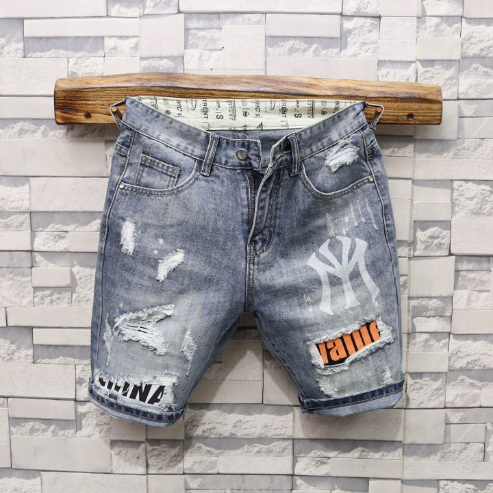 Light Blue Ripped Denim Bermuda Shorts For Men: Loose Fit Style
