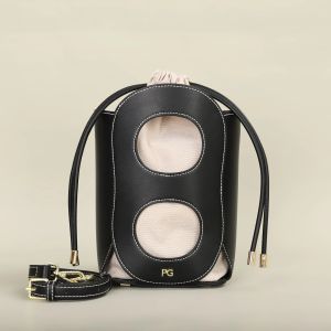 PATSY PG GARIS: A luxury brand women’s crossbody bag with a hollow design offering a classic and fashionable look. It’s a women’s shoulder bag.