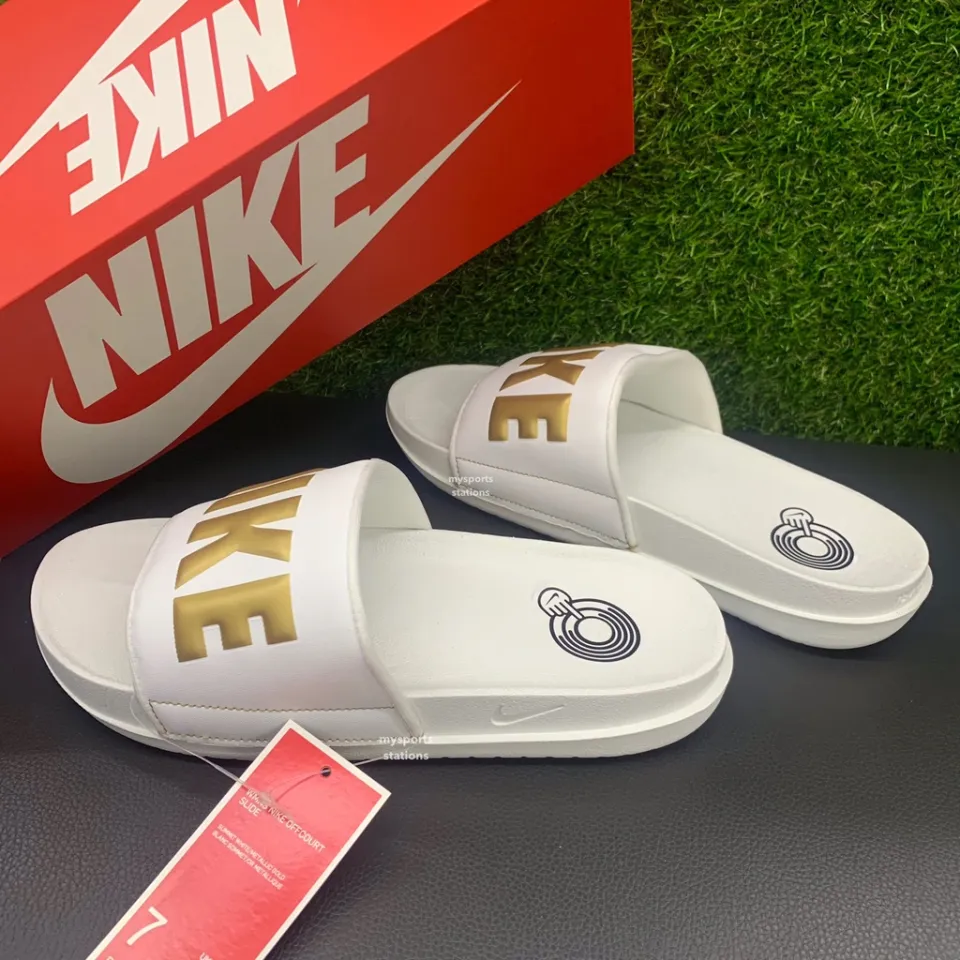 Womens gold nike online slides