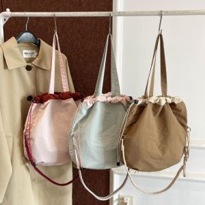 XUNXUAN สไตล์เกาหลีแบบ ถุงสิริ drawstring ไนลอนทำจากไนลอน น้ำหนักเบามาก กระเป๋าโท้ทความจุขนาดใหญ่ แฟชั่นสำหรับผู้หญิง กันน้ำกันน้ำได้ กระเป๋าสะพายไหล่สำหรับผู้หญิง การเดินทางการเดินทาง