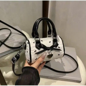 Túi xách nữ đeo chéo dáng trống trần nơ phối mác nơ tim  đáng yêu HĐ 314