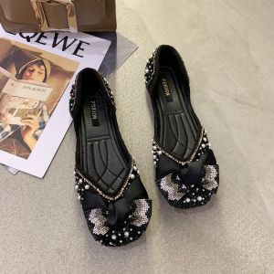 Ielgy nơ giả kim cương con la của phụ nữ phẳng 2024 mới đa năng máy bơm với váy dép