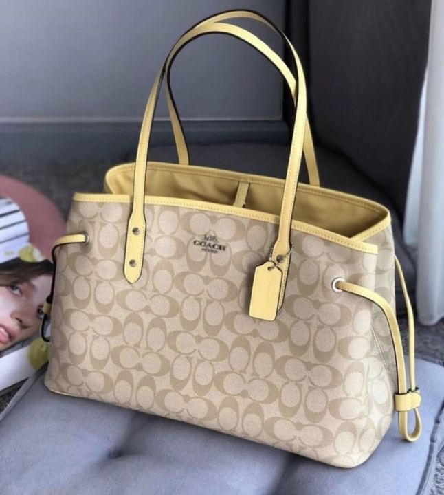 Coach signature drawstring tote best sale