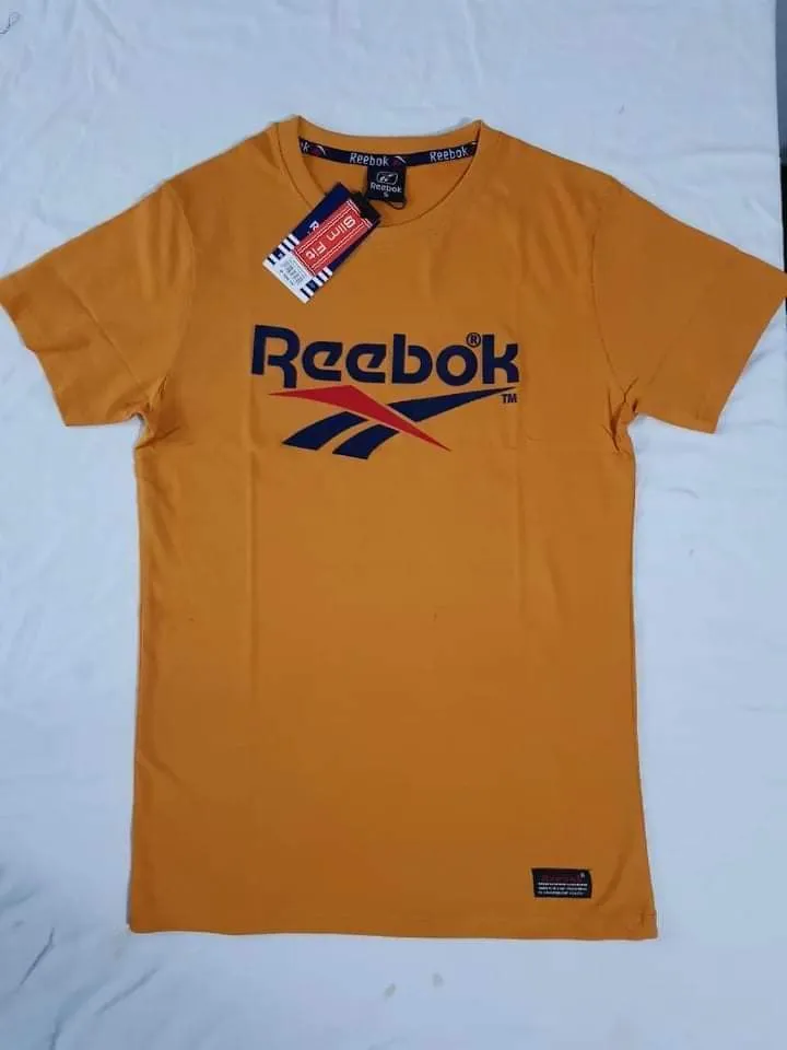 Pull reebok homme sale orange