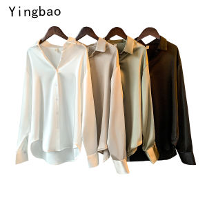 Yingbao เสื้อเชิ้ตผ้าไหมซาตินแขนยาวผู้หญิงเสื้อเบลาส์ใส่ทำงานสำหรับมืออาชีพทรงหลวมเรียบง่ายสีพื้นสำหรับสุภาพสตรีเสื้อลำลองธุรกิจหรูหราเสื้อไซส์ใหญ่สไตล์เกาหลีไซส์ใหญ่ปี S-5XL