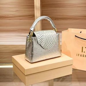 Genuine leather womens bag with crocodile pattern texture trendy small bag versatile for shoulder crossbody or backpack use simple and stylish handbag