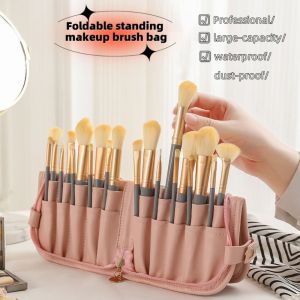 STARGOODS หนังพียู กระเป๋าแปรงแต่งหน้า จุได้มาก สีครีมทาหน้า กระเป๋าเก็บแปรง มืออาชีพอย่างมืออาชีพ ป้องกันฝุ่นป้องกัน ที่วางแปรงเครื่องสำอาง ช่างแต่งหน้าแต่งหน้า