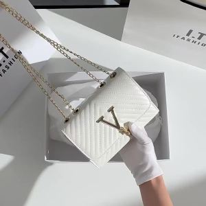 Trendy womens bags 2026 New Fashionable Striped Embroidered Shoulder Bag V Crossbody bag with tassel decoration available for dropshipping