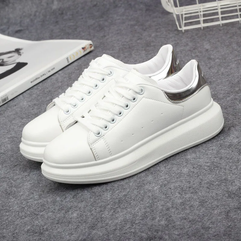 Alexander McQUEEN Sneakers in white/ black/ silver