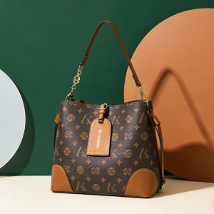 MKF Large Capacity Bag for Women 2026 Trendy niche bucket bag with contrasting colors crossbody shoulder bag in European and American vintage style