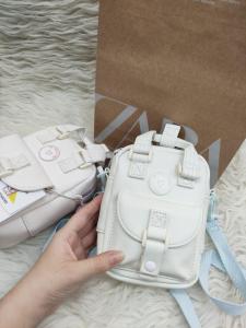 tas selempang zra uv bonus paperbag(tas unik berubah warna saat kena cahaya)