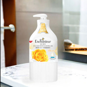 Sữa Tắm Trắng Da & Dưỡng Ẩm Có Hạt Enchanteur White Charming Sensation 650g – Hương Nước Hoa Quyến Rũ