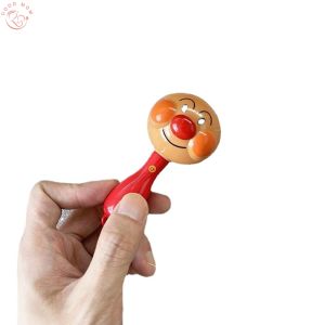 Bread Superman Ringing bell toy Baby hand bell Childrens musical instruments colored bell castanet sand hammer toy baby rattle toy Early education toy