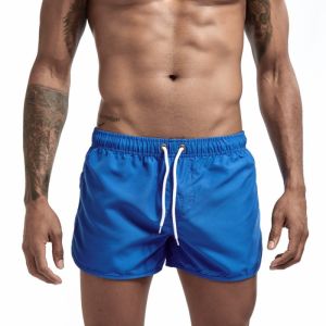 AliExpress   Hot Sale   Mens beach shorts polyester mid-length shorts classic quick-dry sports trendy three-quarter shorts for men