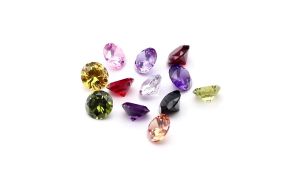 Wuzhou Synthetic Gemstone Zircon Factory 5A3-15mm White colored round pointed cubic zirconia stone 2026
