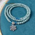 Vòng tay phong thủy đá Mã Não màu xanh cẩm thạch xen kẽ viên Lapis Lazuli cắt giác phong cách đeo quấn 3 vòng phối charm hoa tuyết | Hoa Minh Gem. 