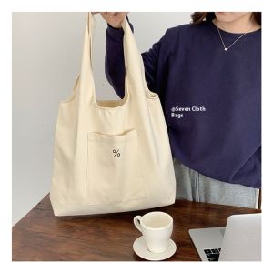 SEA YADOU กระเป๋าผ้าใบสีครีมพิมพ์สัญลักษณ์เปอร์เซ็นต์ ใส่ได้เยอะ ใช้ไปเรียนหรือเดินทางประจำวัน
