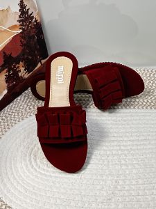 Mimi brand olive green slide sandals with ruffle strap detail. Flat sole suitable for casual wear