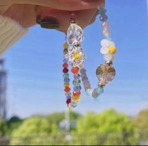 Lắc tay chuỗi pha lê và hoa xinh xắn