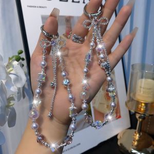 LITUILI MALL  ป้องกันการสูญหาย สายโซ่โทรศัพท์แบบโบว์ หัวใจ ห้อย สายคล้องโทรศัพท์มือถือ ตกแต่งกระเป๋า ลัทธิหรูหราเบา จี้โทรศัพท์สำหรับเด็กผู้หญิง ผู้หญิง ผู้หญิงสาว