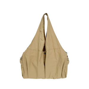 Japanese-style artistic minimalist and large-capacity tote bag for women featuring multiple pockets suitable for casual use as a mommy bag or for travel