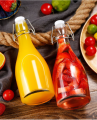 Chai thủy tinh Giara tròn bầu nắp gài 500ml 1000ml. 