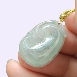 A Icy Translucent Ruyi Pendant Natural Type A Jadeite Jade added with 18k Clasp certificate weighs 3.98 grams measurement 25.5 * 17.5 * 4.8 mm (18kp96)