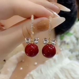 Bông tai ngọc trai đỏ nữ tính sang trọng cao cấp nhẹ nhàng kiểu dáng nơ mẫu mới hot trend khuyên tai kim bạc bán sỉ.