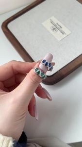 Xiaohongshu s925 Pure silver oval twisted ring for women inlaid with zircon European and American light luxury unique and popular niche ring