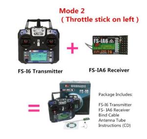 Flysky FS-i6 2.4G 6ch RC Transmitter Controller FS-iA6 Receiver For RC Helicopter Plane Quadcopter Glider. Black with blue accents dual joysticks digital display buttons and antenna.