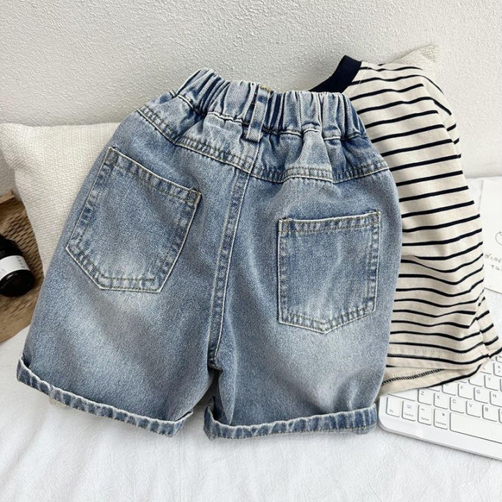 Quần short jean bé trai phong cách bụi bặm xanh sáng