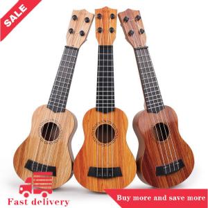 [COD] 1pcs học tập quà tặng giáo dục 26 35cm trẻ em guitar 4 dây nhạc cụ với mái chèo mô phỏng yukrili Đồ chơi âm nhạc