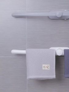 Hanging a towel rack with no punching bathroom hanging rack bathroom hanging rod storage rack hook and nail free easy to use