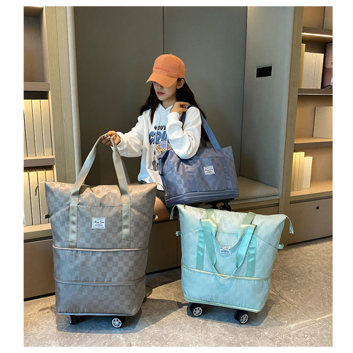 %F0%9F%92%96SG%20local%20stock%20%F0%9F%92%96Travel%20bag%20with%20wheels/Travel%20bagpack/Luggage%20bag/Duffle%20bag/Foldable%20tote%20bag%20waterproof%20with%20wheel%20-%20Image%202