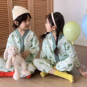 ชุดนอนเด็กชาย เด็กหญิง ติดกระดุก แบบหลวมตัวการ์ตูนเล็ก (พร้อมส่งในไทย)