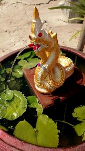 พญานาคพ่นน้ำ ปูนปั้น