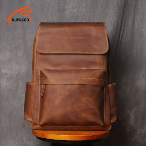 NUPUGOO เป้หนังแท้แนวย้อนยุคกระเป๋าเป้หนังวัวชั้นแรกกระเป๋าเดินทางแบบสบายๆกระเป๋าคอมพิวเตอร์ความจุขนาดใหญ่สําหรับ15.6นิ้ว