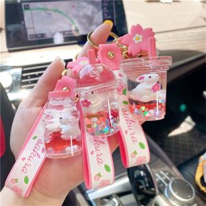 CRNGW SAKURA SAKURA ของขวัญ KEYFOB ของเหลวเคลื่อนที่ได้ ดอกเชอร์รี่บาน ขวดเครื่องดื่มน้ำ จี้ห้อยกระเป๋า พวงกุญแจถ้วยชานมกระต่าย พวงกุญแจรูปกุญแจ พวงกุญแจ Boba พวงกุญแจเหลว