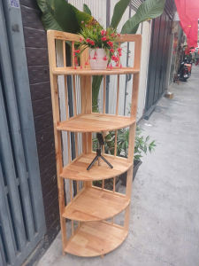 Kệ góc 5 tầng sâu 38cm ngang 38cm cao 157 cm  gỗ cao su  màu tự nhiên  bóng  đẹp đã xử lý tẩm sấy chống mối mọt bền hơn nhiều so với gỗ thông và MDF. Đa năng dễ di dời.tháo ráp.