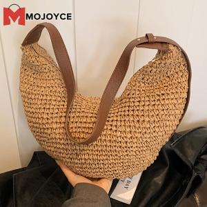 MOJOYCE Women Handwoven Straw Half Moon Crossbody Bag with Adjustable Strap Perfect for Outdoor Travel and Daily Use in Natural Tones